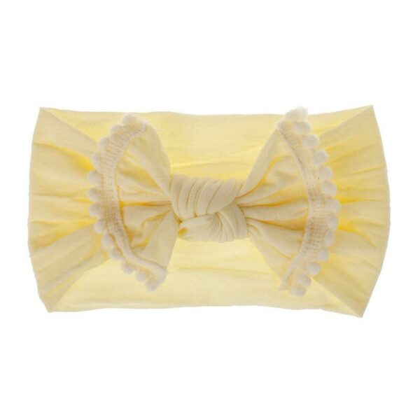 Bandeau Bébé Fille Nolwenn Le Bandeau Français | Bandeau Cheveux Femme <p>Notre bandeau bébé Nolwenn est caractérisé par un élégant effet noué et des pompons charmants. Disponible en plusieurs coloris, il s'adapte parfaitement à tous les styles.</p>