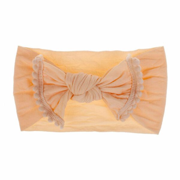 Bandeau Bébé Fille Nolwenn Le Bandeau Français | Bandeau Cheveux Femme <p>Notre bandeau bébé Nolwenn est caractérisé par un élégant effet noué et des pompons charmants. Disponible en plusieurs coloris, il s'adapte parfaitement à tous les styles.</p>