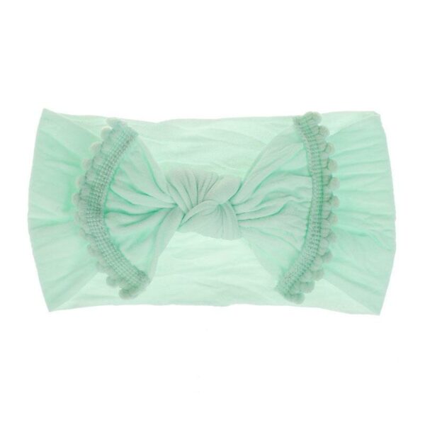 Bandeau Bébé Fille Nolwenn Le Bandeau Français | Bandeau Cheveux Femme <p>Notre bandeau bébé Nolwenn est caractérisé par un élégant effet noué et des pompons charmants. Disponible en plusieurs coloris, il s'adapte parfaitement à tous les styles.</p>