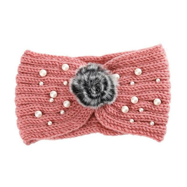 Bandeau cheveux en laine à pompom Ema Le Bandeau Français | Bandeau Cheveux Femme <h3>Accentuez votre look professionnel avec le bandeau cheveux en laine à pompom Ema. Tricoté à la main, ce bandeau ajoute une touche de fantaisie et de personnalité à votre tenue de travail.</h3>
<ul> <li>Fabrication : Tricoté main</li> <li>Taille : Bandeau Ema en taille unique</li> <li>Dimensions : 21 cm longueur x 11 cm hauteur</li> <li>Composition : Laine mérinos, perles acryliques</li> <li>Type : Bandeau cheveux hiver femme idéal pour le bureau</li>
</ul>
<p>Parfait pour les jeunes professionnels, ce bandeau cheveux combine élégance et simplicité, permettant de créer des looks polies et personnalisés en un instant.</p>